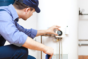 A man fixing bolier breakdowns