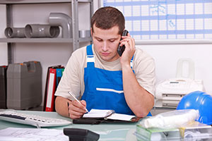 Plumber filling out a self assessment form