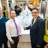 Flame staff with MP in bathroom showroom