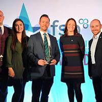 Flame Heating Group Staff With Award