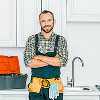 Plumber smiling about the plumbing bursary being back